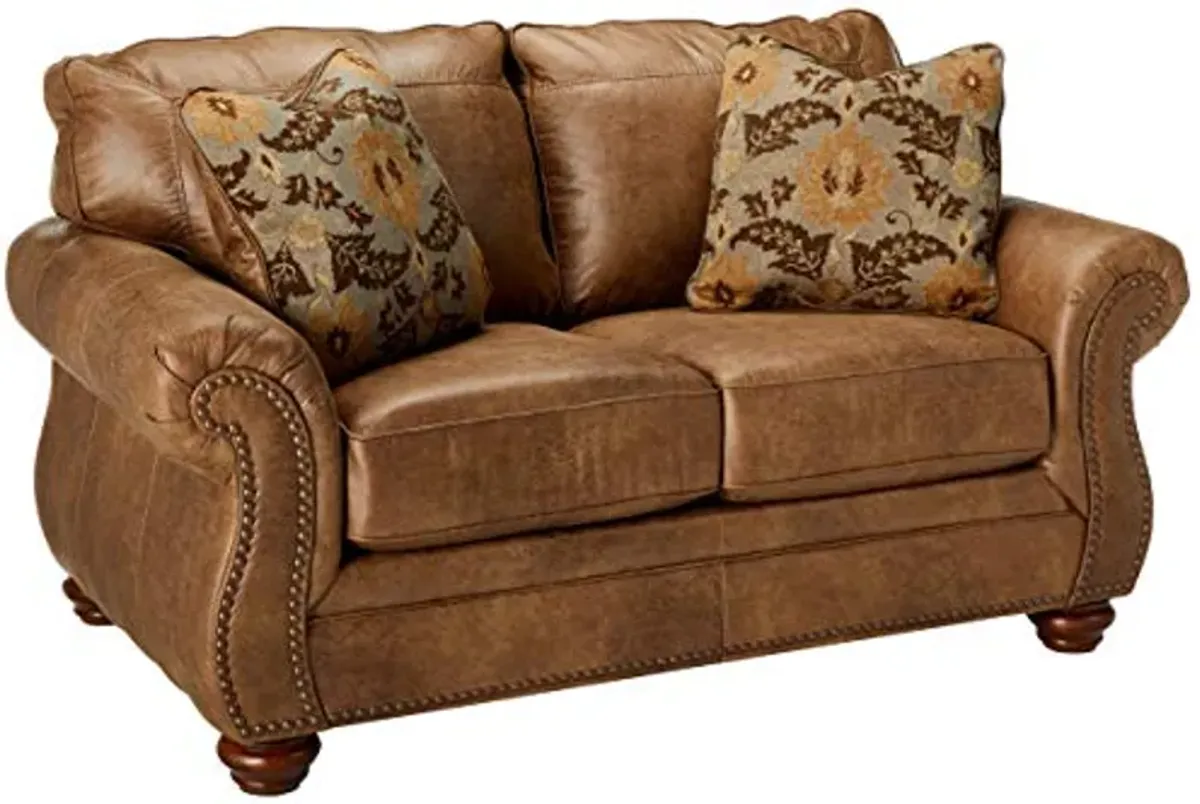 Signature Design by Ashley Larkinhurst Faux Leather Loveseat with Nailhead Trim and 2 Accent Pillows, Brown