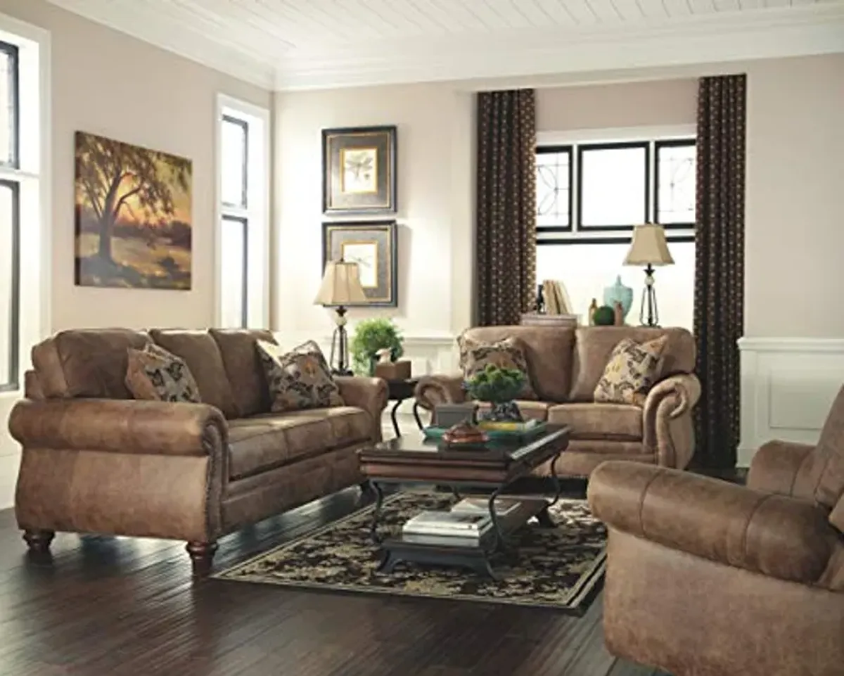 Signature Design by Ashley Larkinhurst Faux Leather Queen Sofa Sleeper with Nailhead Trim and 2 Accent Pillows, Brown