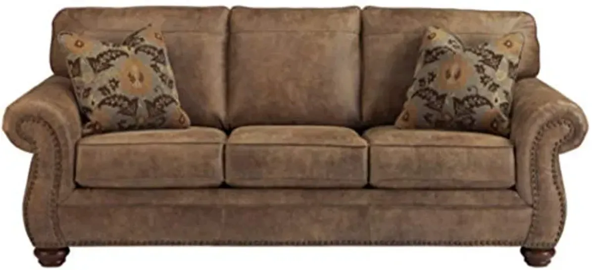 Signature Design by Ashley Larkinhurst Faux Leather Queen Sofa Sleeper with Nailhead Trim and 2 Accent Pillows, Brown