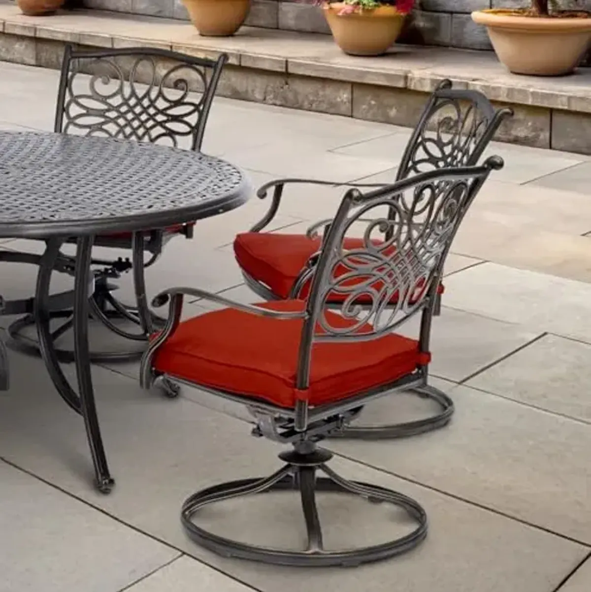 Hanover Traditions 7-Piece Patio Dining Set with 60" Round Cast-Top Table and Swivel Rockers with Autumn Berry Cushions, Patio Dining Set for 6, Premium Weather Resistant Outdoor Dining Set