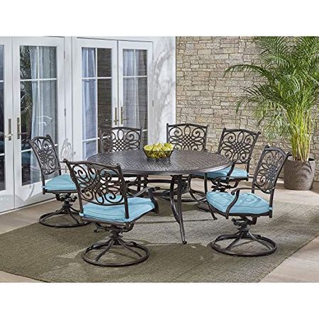 Hanover 7-Piece Blue Six Traditions 60" Round Cast-Top Table and 6 Swivel Rockers Cushions, Patio Dining Set for 6, Premium Weather Resistant Outdoor Furniture