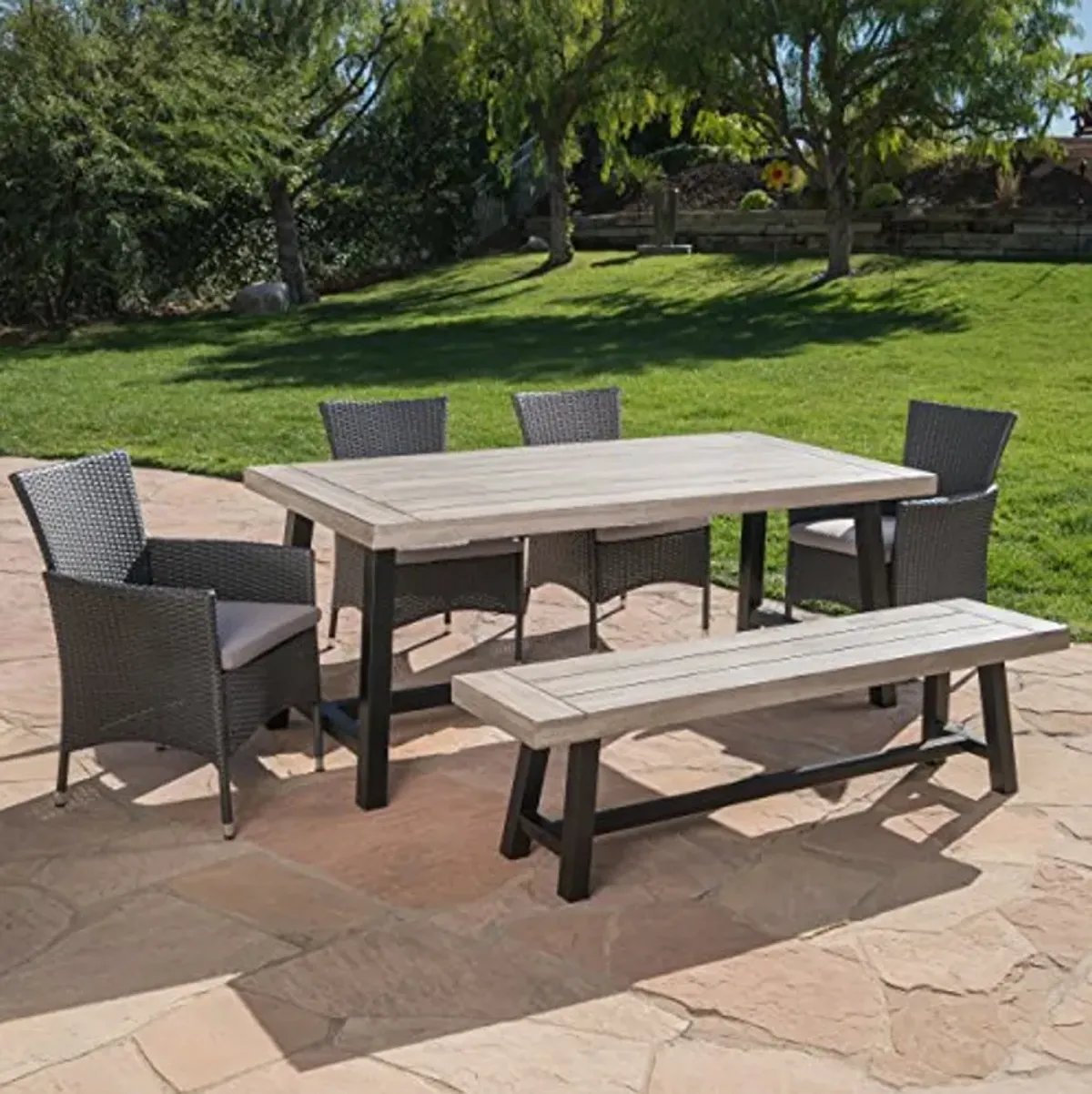 Christopher Knight Home Linda Outdoor Wicker Dining Set with Acacia Wood Table and Bench and Water Resistant Cushions, 6-Pcs Set, Sandblast Light Grey / Black Rustic Metal / Grey / Silver Cushions