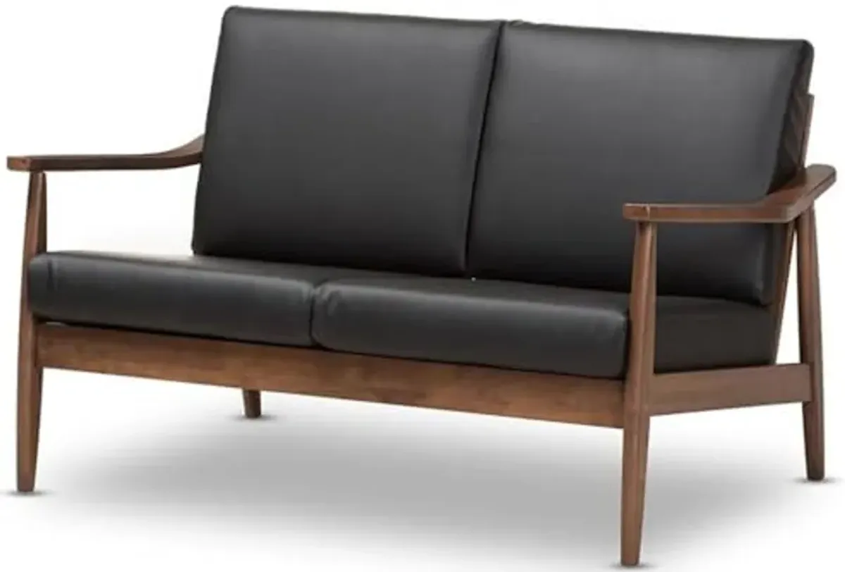 Baxton Studio Venza Mid-Century Modern Walnut Wood Black Faux Leather 2-Seater Loveseat/Mid-Century/Black/Walnut Brown/Faux Leather/Rubber Wood