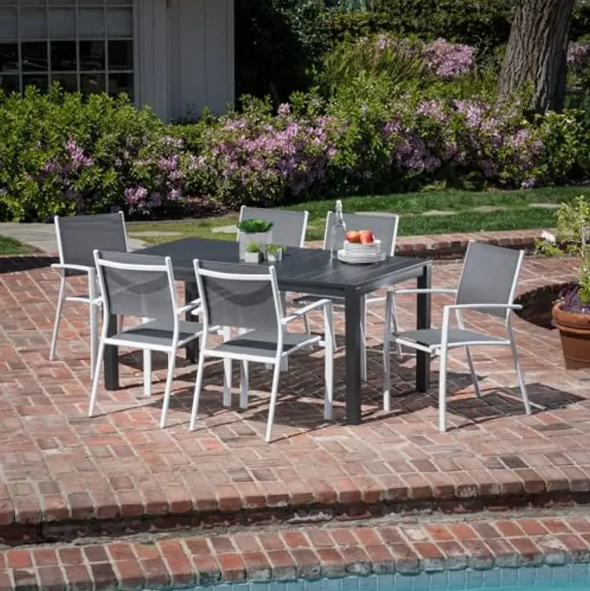 Hanover Naples 7-Piece Outdoor Dining Set, Aluminum 63" x 35" Patio Table with 6 Quick Drying Stackable Sling Chairs, Modern, Comfortable, and Weather-Resistant, White/Gray