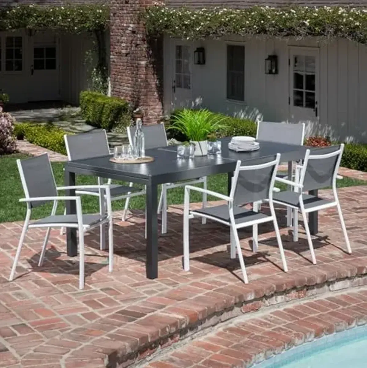 Hanover Naples 7-Piece Outdoor Dining Set with 40" x 118" Expanding Patio Table and 6 Stackable Sling Chairs, Modern, Comfortable, and Weather-Resistant Aluminum Patio Dining Set for Porch, Backyard