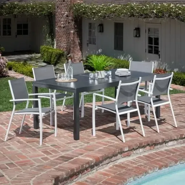 Hanover Naples 7-Piece Outdoor Dining Set with 40" x 118" Expanding Patio Table and 6 Stackable Sling Chairs, Modern, Comfortable, and Weather-Resistant Aluminum Patio Dining Set for Porch, Backyard