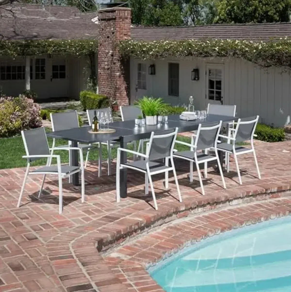 Hanover Naples 9-Piece Outdoor Dining Set with Aluminum 40" x 118" Expandable Patio Table and 8 Stackable Sling Chairs, Modern, Comfortable, and Weather-Resistant Patio Dining Set for 8, Gray/White