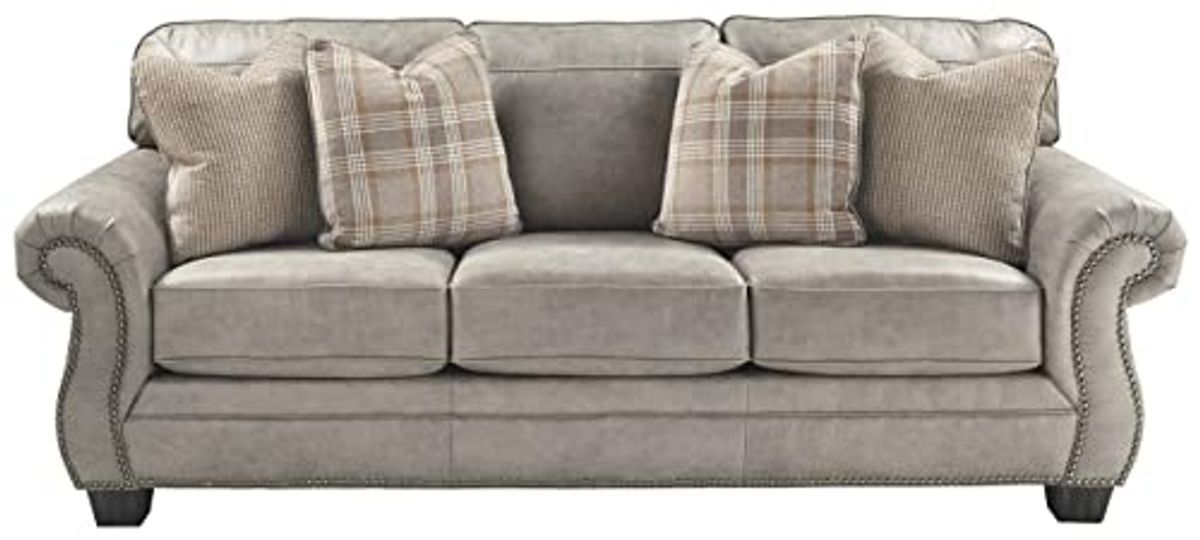 Signature Design by Ashley Olsberg Faux Leather Queen Sofa Sleeper with Nailhead Trim and 4 Accent Pillows, Gray