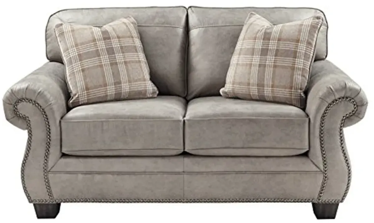 Signature Design by Ashley Olsberg Faux Leather Loveseat with Nailhead Trim and 2 Accent Pillows, Gray