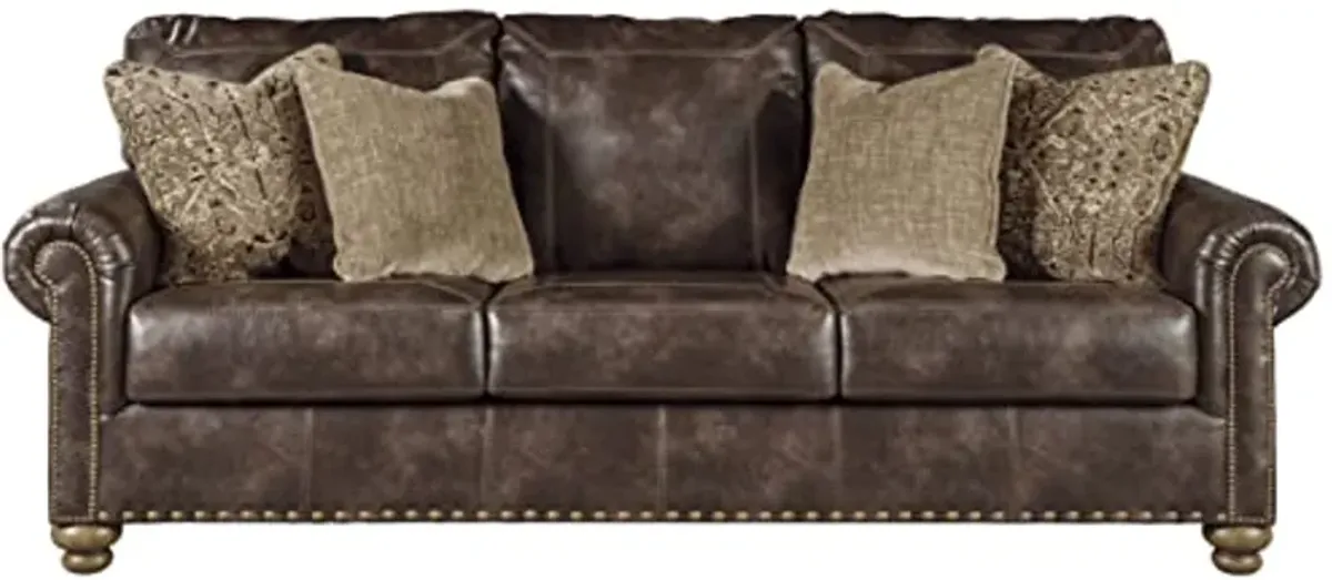 Signature Design by Ashley Nicorvo Traditional Faux Leather Sofa with Gold Nailhead Trim, Brown