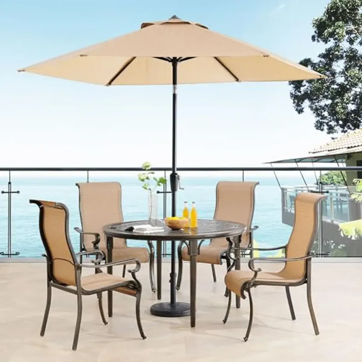 Hanover Brigantine 5-Piece Modern Outdoor Dining Set with 9 Ft. Umbrella, 4 Stackable Sling Chairs, 50'' Round Cast-Top Table, Weather, Rust, UV Resistant, Tan/Bronze