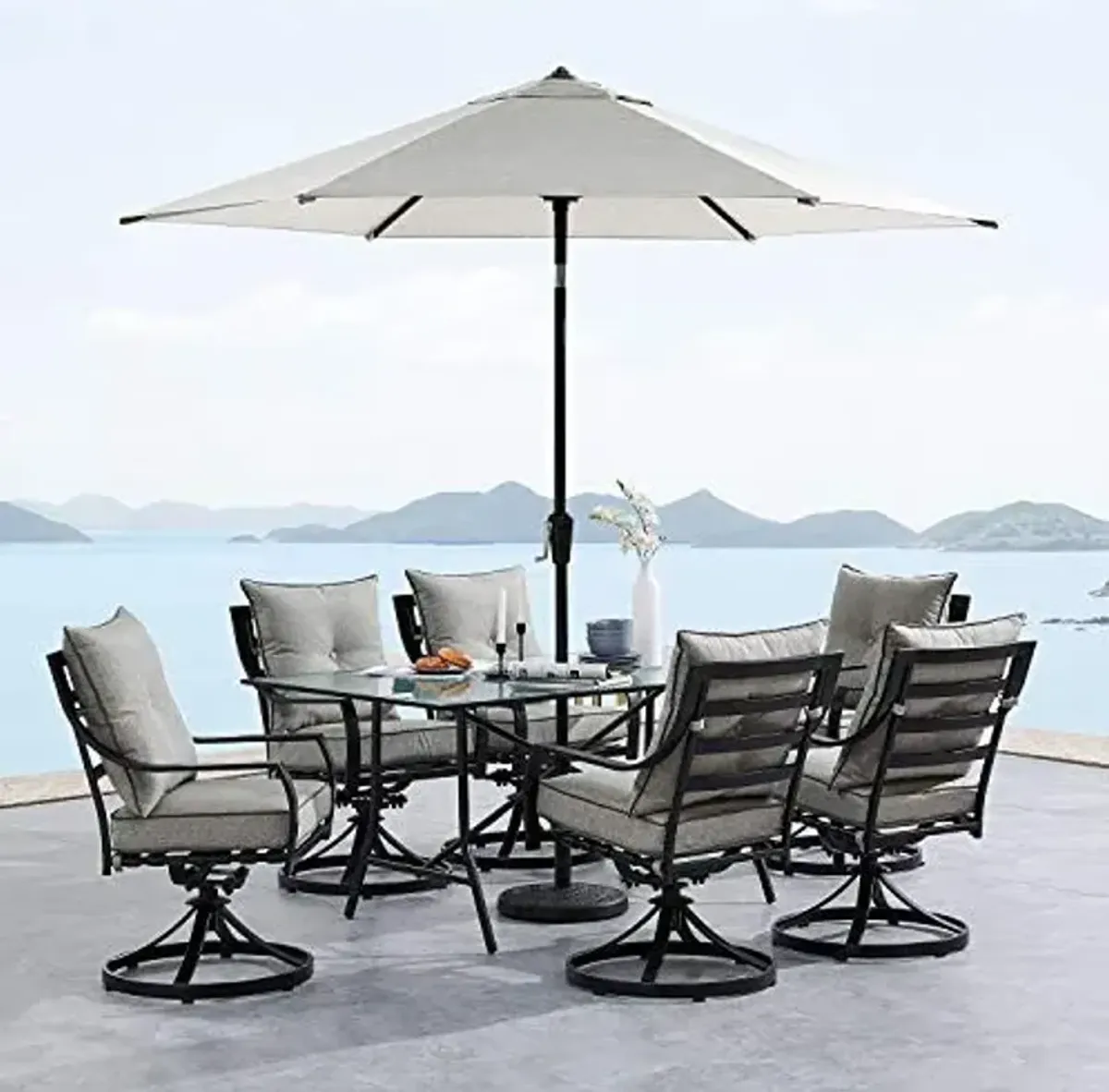 Hanover Lavallette 7-Piece Modern Outdoor Dining Set with Umbrella, 2 Swivel Rockers, 4 Stationary Chairs, Silver Cushions, and 66'' x 38'' Glass-Top Table, Weather and UV Resistant Outdoor Patio Set