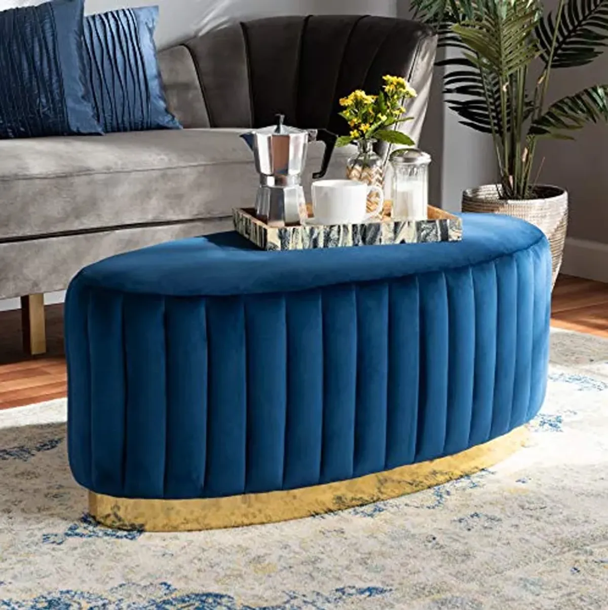 Baxton Studio Kirana Glam and Luxe Navy Blue Velvet Fabric Upholstered and Gold PU Leather Ottoman