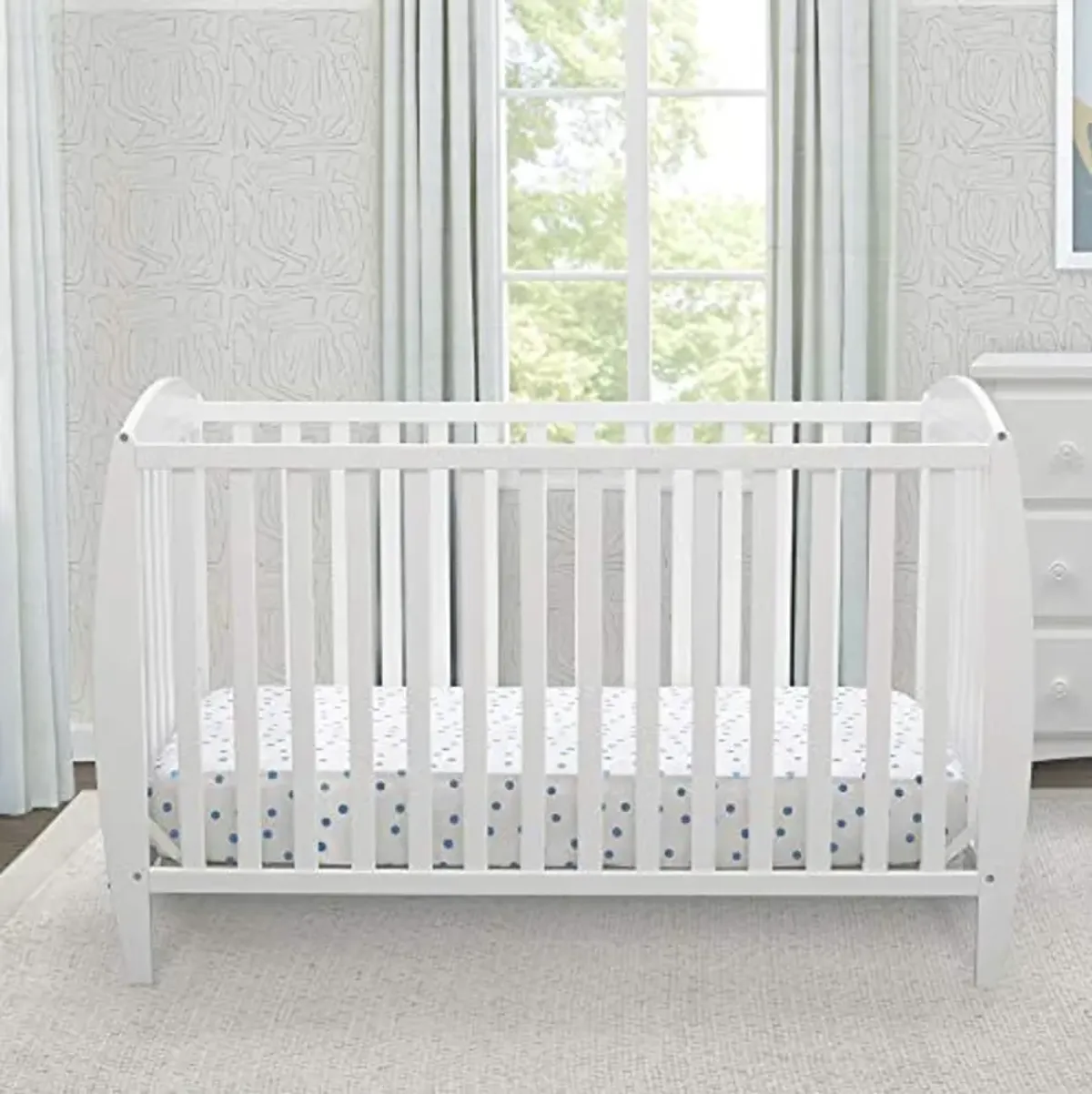 Delta Children Twinkle 4-in-1 Convertible Baby Crib, Sustainable New Zealand Wood, White and Delta Children Twinkle Galaxy Dual Sided Recycled Fiber Core Crib and Toddler Mattress (Bundle)