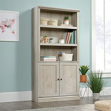 Sauder Miscellaneous Bookcase with Doors, L: 35.28" x W: 13.23" x H: 69.76", Chalked Chestnut Finish & Edge Water Executive Desk, L: 65.12" x W: 29.53" x H: 29.37", Chalked Chestnut Finish