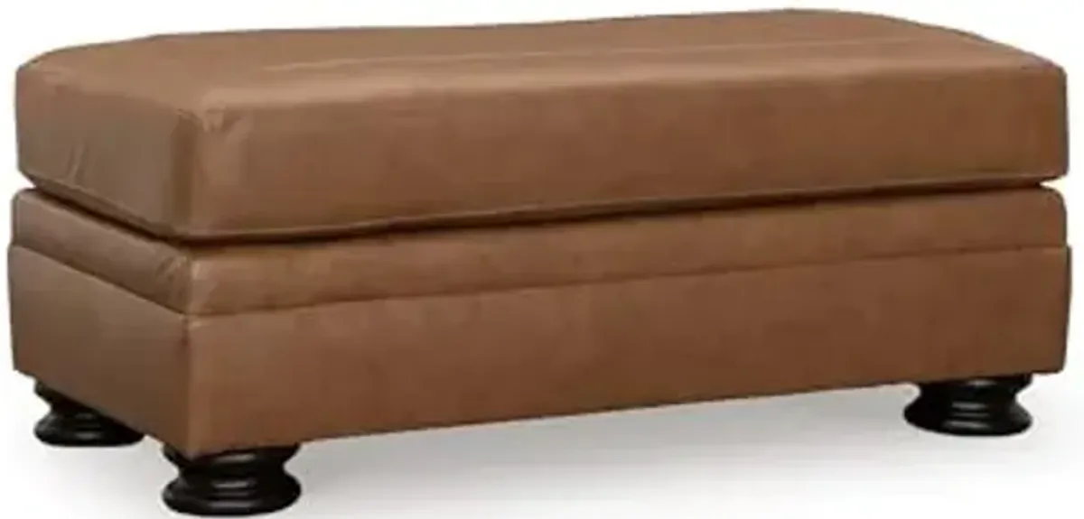 Signature Design by Ashley Carianna Traditional Firmly Cushioned Leather Rectangular Ottoman with Decorative Turn Legs, Brown