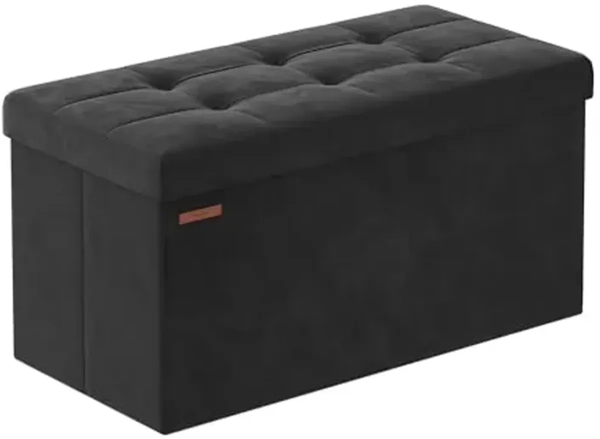 SONGMICS Mazie Collection - Storage Ottoman Bench, Foldable Foot Rest, 15 x 30 x 15 Inches, End of Bed Bench, Storage Chest, Load 660 lb, Living Room, Bedroom, Entryway, Ink Black ULSF247B01
