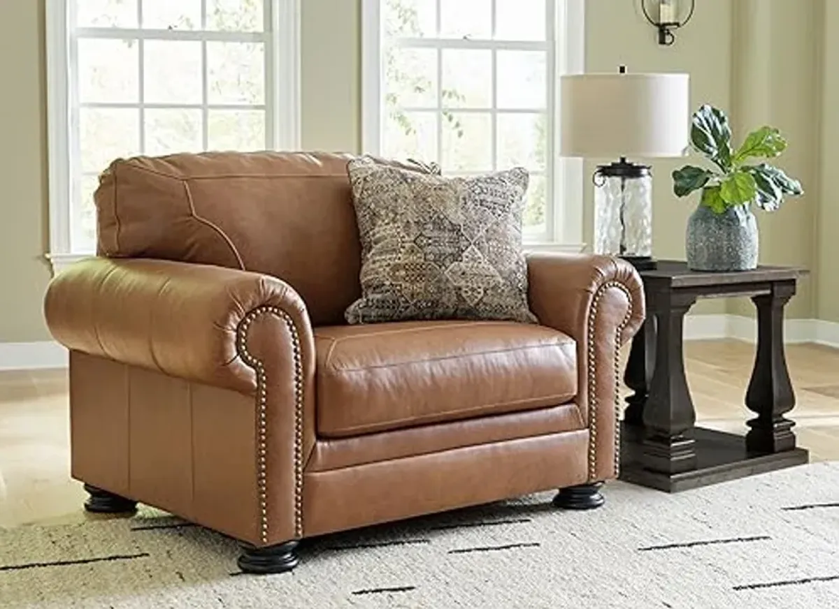 Signature Design by Ashley Carianna Contemporary Leather Match Upholstered Oversized Chair with Nailhead Trim and 1 Accent Pillow, Dark Brown