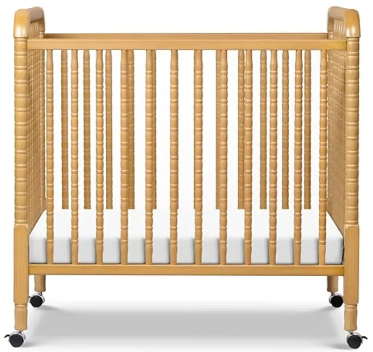 DaVinci Jenny Lind 3-in-1 Convertible Mini Crib in Honey, Removable Wheels, Greenguard Gold Certified