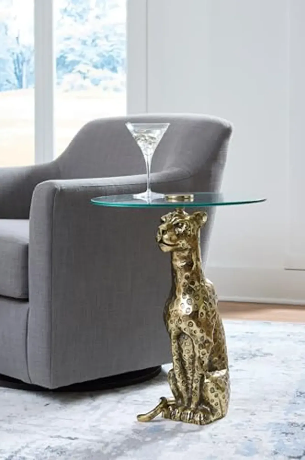 Signature Design by Ashley Vallain Industrial Glass Tabletop Accent Table with Leopard Base, Metallic & Glass