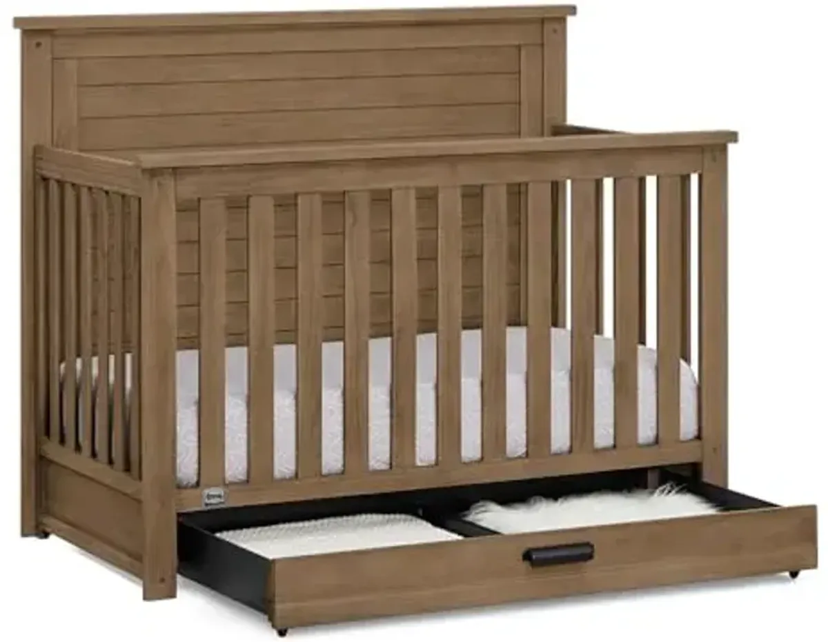 Delta Children Simmons Kids Caden 6-in-1 Convertible Crib with Trundle Drawer, Greenguard Gold Certified, Aged Oak