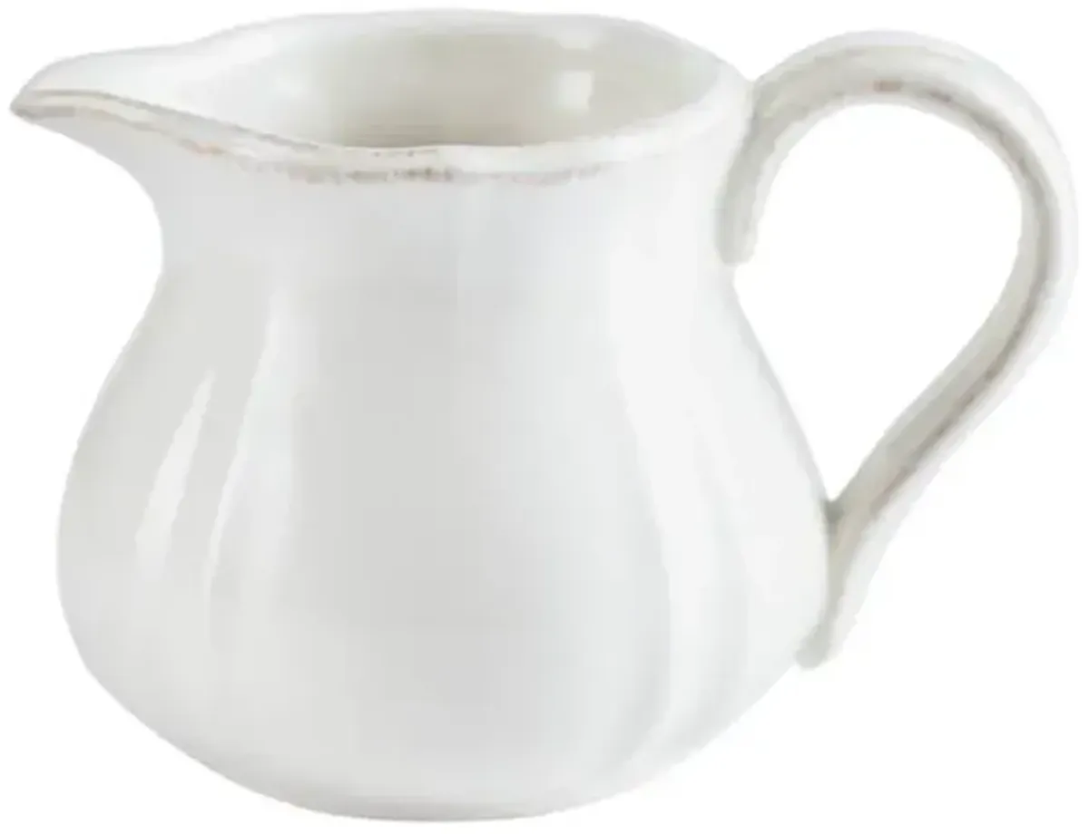 White Scalloped Creamer Jar