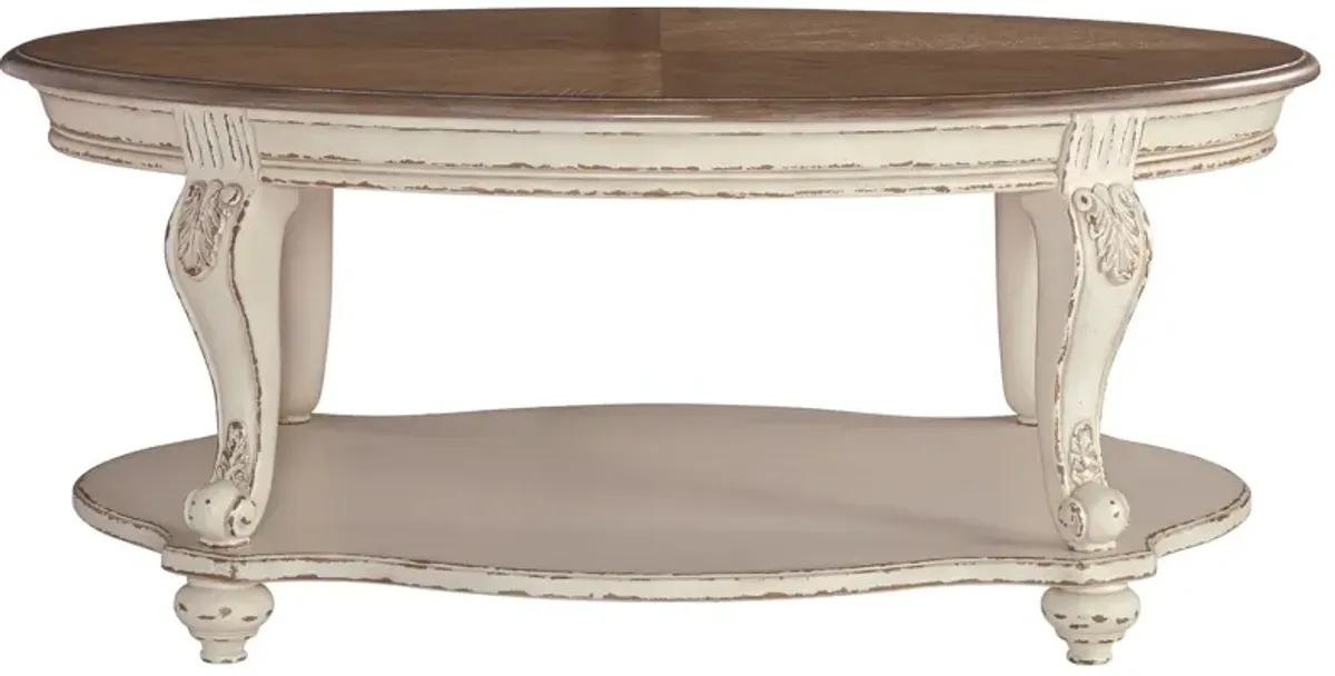 Realyn - White / Brown - Oval Cocktail Table