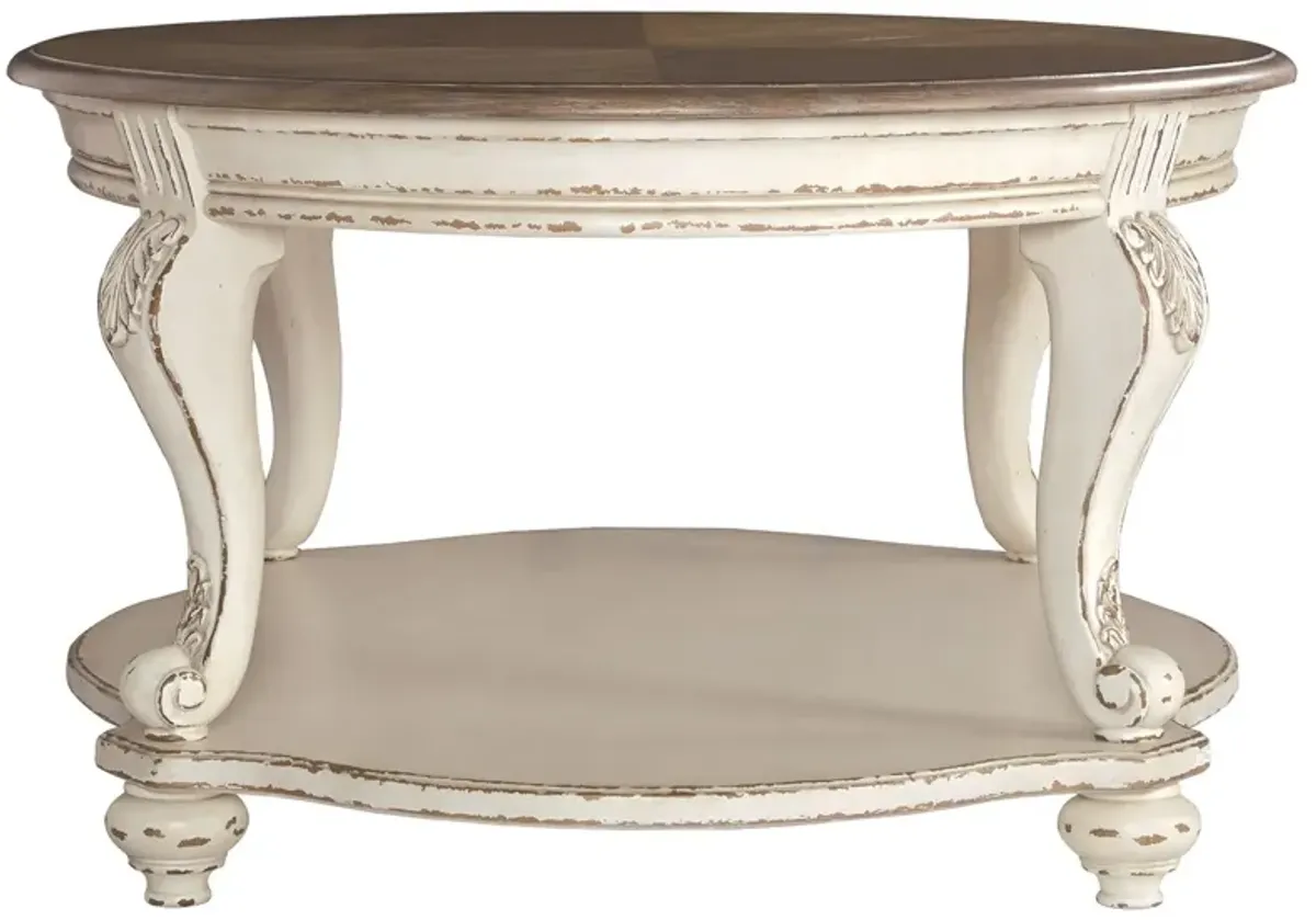 Realyn - White / Brown - Oval Cocktail Table