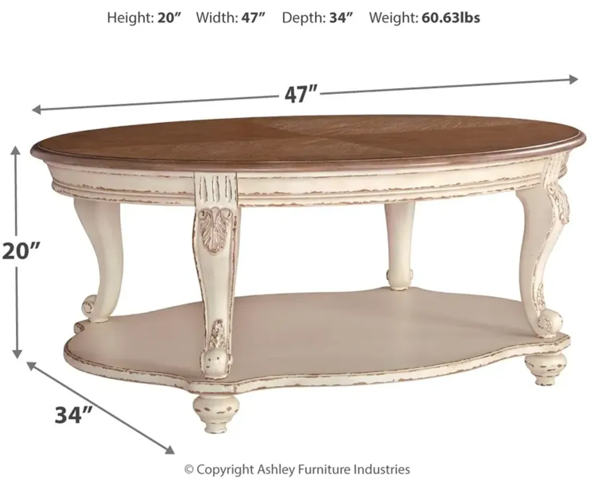 Realyn - White / Brown - Oval Cocktail Table