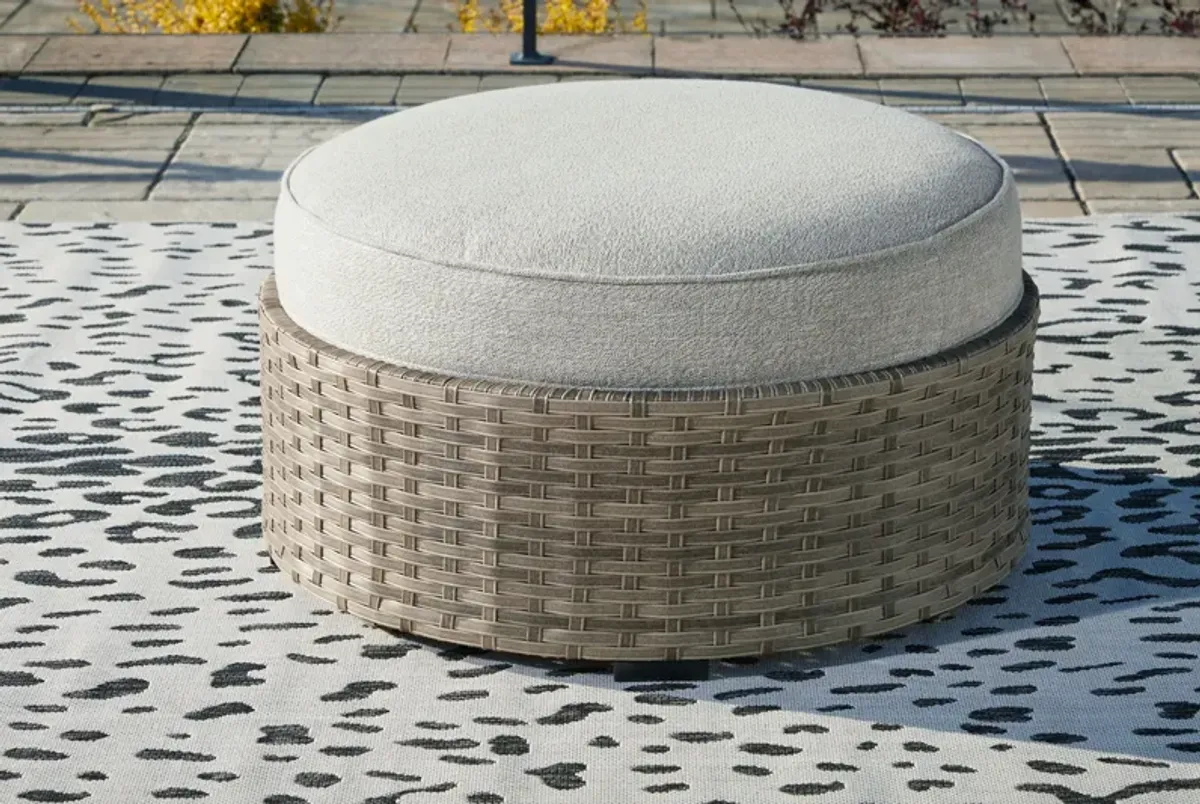 Calworth - Beige - Ottoman with Cushion