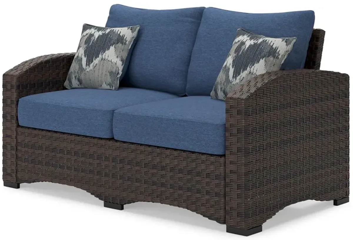 Windglow - Blue / Brown - Loveseat With Cushion