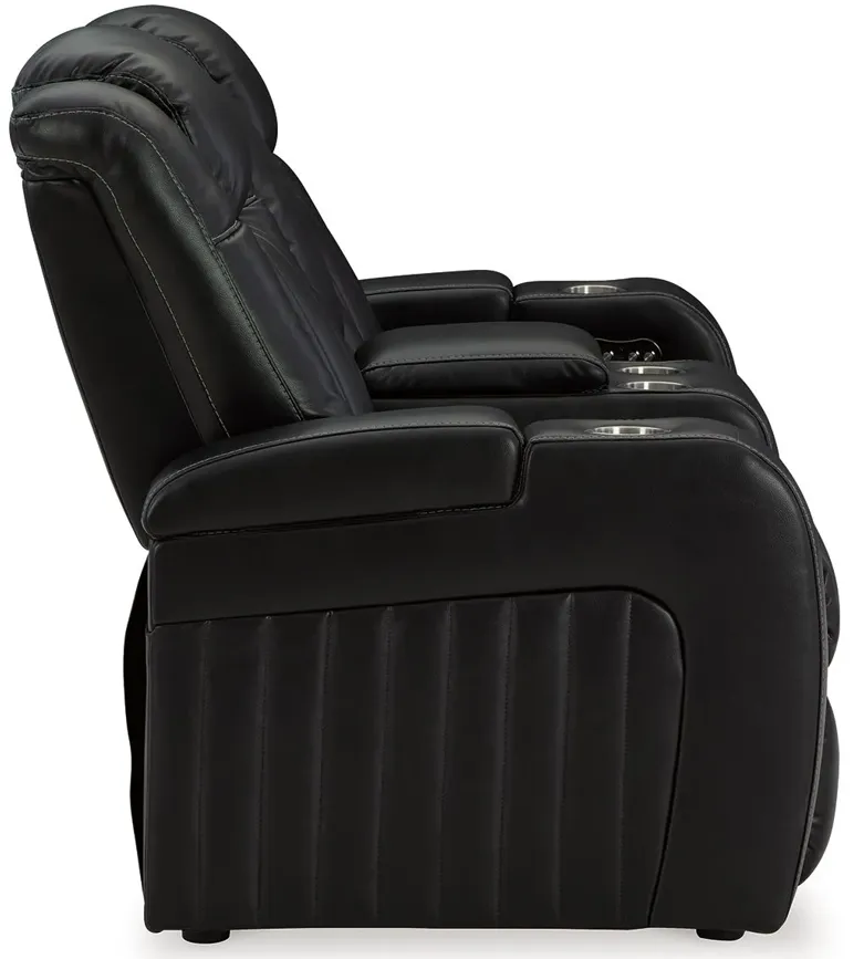 Caveman Den - Midnight - Power Reclining Loveseat With Console/ Adj Hdrst