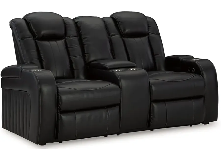 Caveman Den - Midnight - Power Reclining Loveseat With Console/ Adj Hdrst