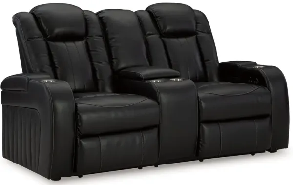 Caveman Den - Midnight - Power Reclining Loveseat with Console/ Adj Hdrst