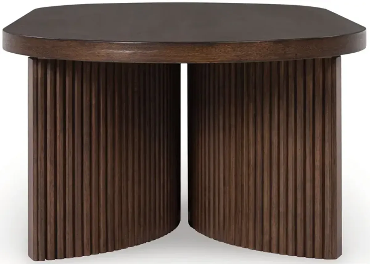 Korestone - Dark Brown - Oval Cocktail Table