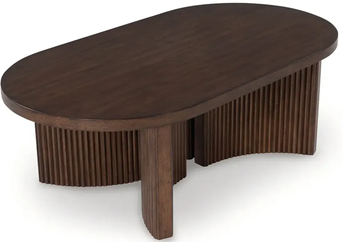 Korestone - Dark Brown - Oval Cocktail Table