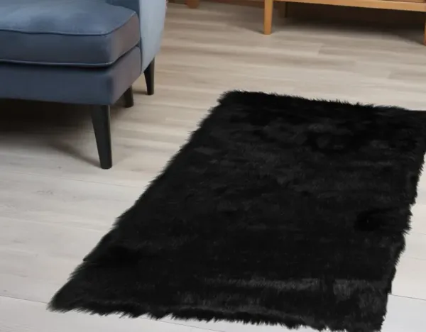 2' x 3' Faux Fur Animal Print Area Rug - Black