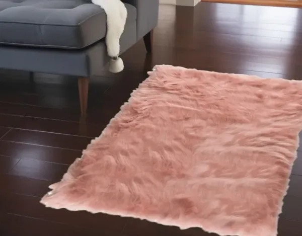 24" x 36" x 1.5" Plush Faux Sheepskin Area Rug - Dusty Rose