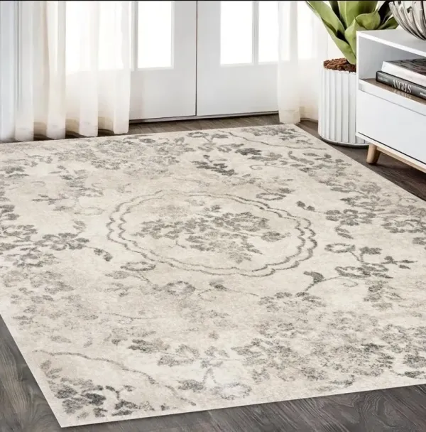 5' x 8' Machine Woven Distressed Floral Medallion Indoor Area Rug - Gray