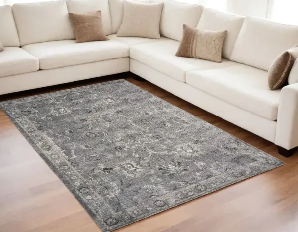 5' x 8' Vintage Floral Bordered Indoor Area Rug - Gray