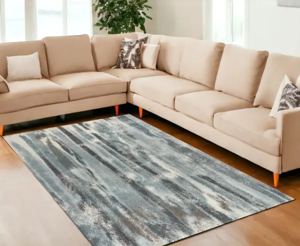 7' x 10' Machine Woven Abstract Stripes Indoor Area Rug - Teal Blue