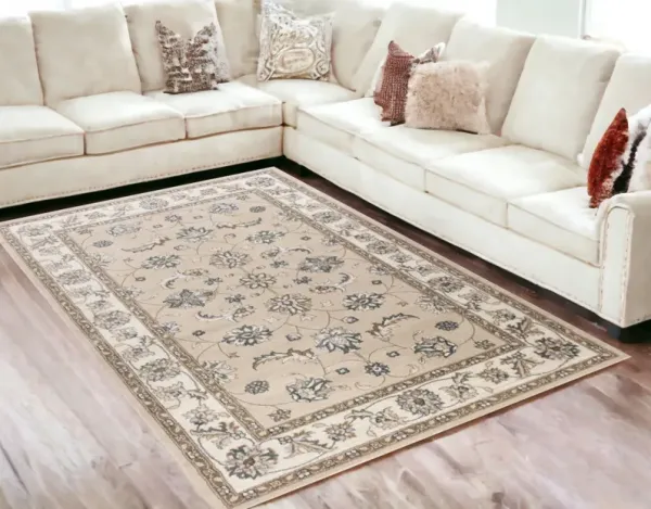 5' x 8' Ivory Bordered Floral Indoor Area Rug - Beige