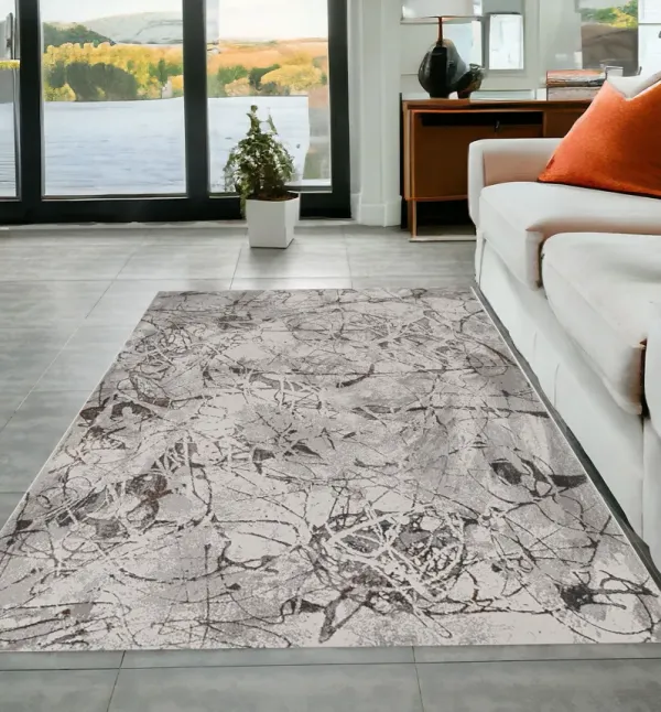5' x 8' Machine Woven Abstract Vermicular Indoor Area Rug - Ivory Gray