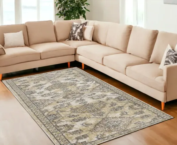 8' x 11' Machine Woven Bordered Floral Vines Indoor Area Rug - Ivory Sand
