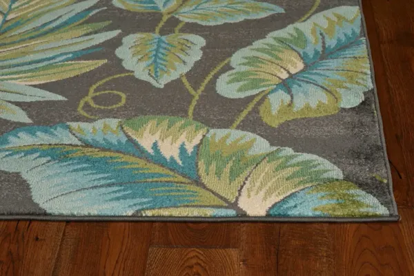 10' x 13' Machine Woven Tropical Leaves Indoor Area Rug - Gray