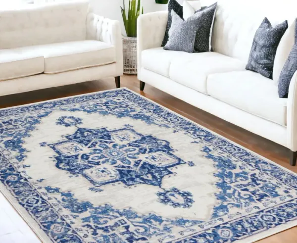5' x 7' Floral Dhurrie Polypropylene Area Rug - Blue And Ivory