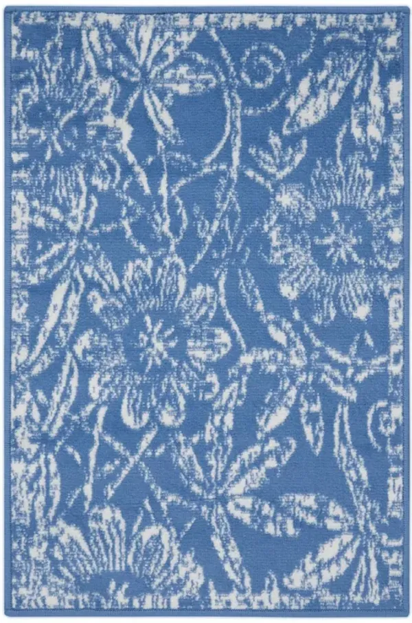 6' x 9' Floral Dhurrie Polypropylene Area Rug - Blue
