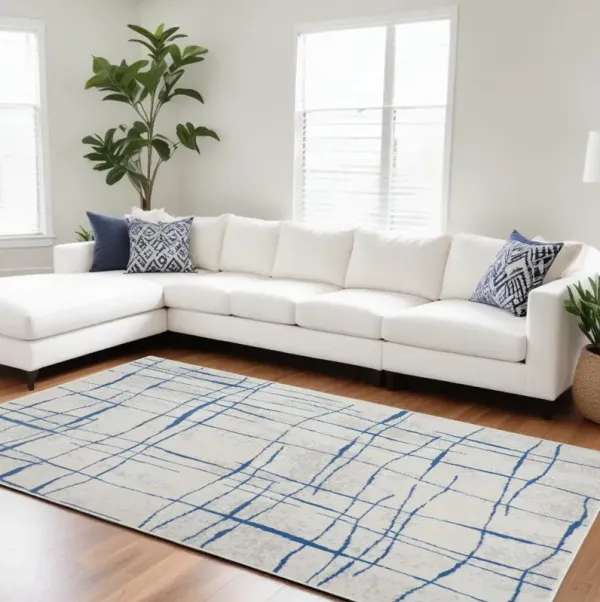 6' x 9' Abstract Dhurrie Polypropylene Area Rug - Blue And Ivory