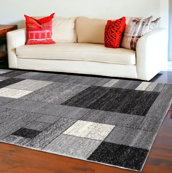 7' x 9' Distressed Geometric Area Rug - Gray
