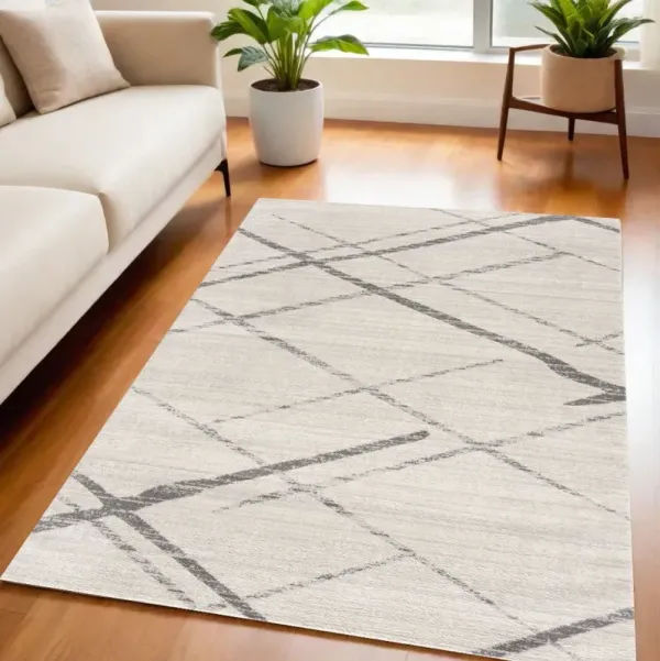 5.3' x 7.6' Modern Geometric Area Rug - Gray And Ivory